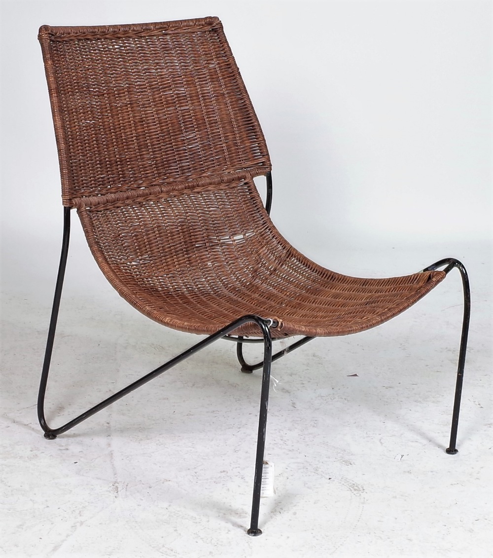 A MODERN CANE AND METAL LOW CHAIR