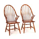 A PAIR OF 20TH CENTURY BEECH WINDSOR ARMCHAIRS (2)