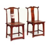 A PAIR OF EARLY 20TH CENTURY CHINESE HARDWOOD YOLK BACK SIDE CHAIRS (2)