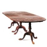 A GEORGE III AND LATER WALNUT TRIPLE PILLAR EXTENDING DINING TABLE