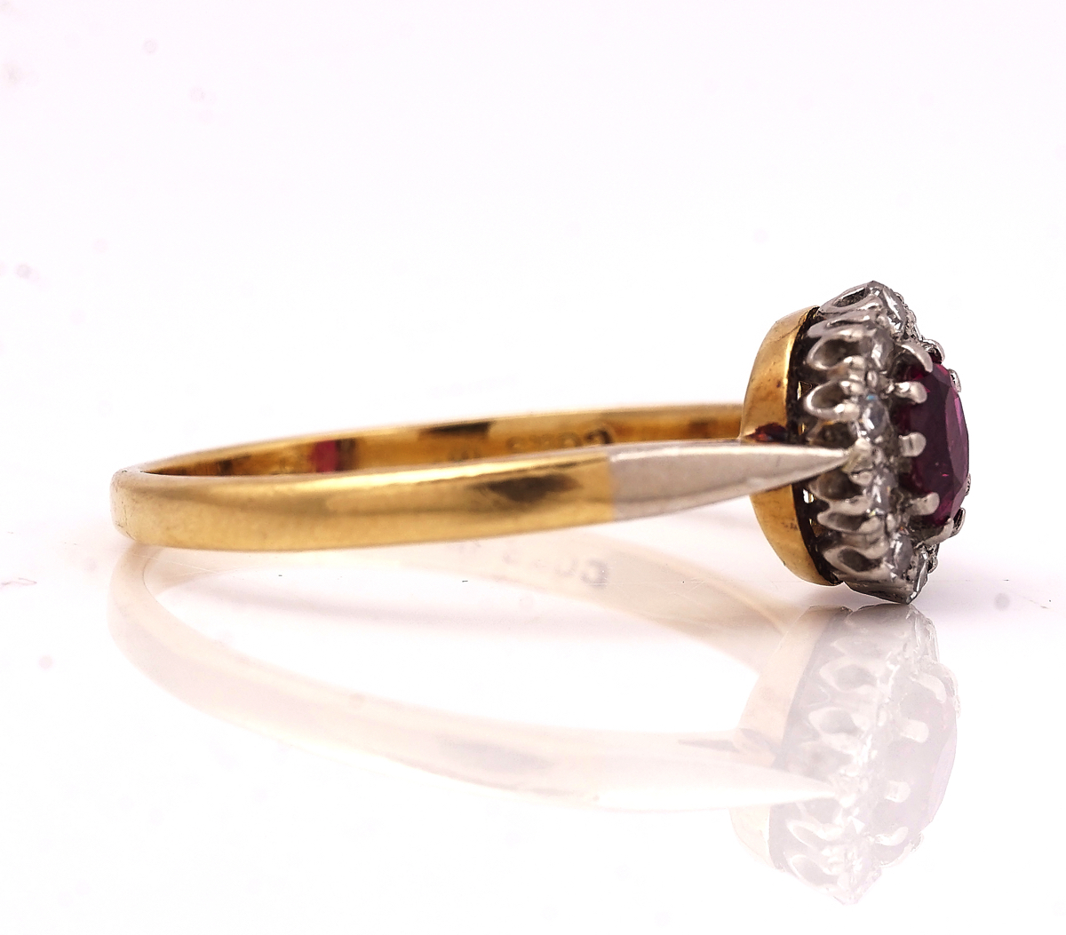 A GOLD, RUBY AND DIAMOND OVAL CLUSTER RING - Image 2 of 2