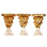 A SET OF EIGHT GILTWOOD ACANTHUS SCROLL WALL BRACKETS