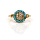 A GOLD, DIAMOND AND TURQUOISE CLUSTER RING