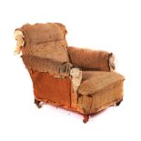 CORNELIUS V SMITH; A VICTORIAN SCROLL BACK EASY ARMCHAIR