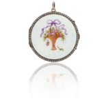 AN ENAMELLED AND COLOURLESS PASTE CIRCULAR PENDANT LOCKET