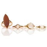 A GOLD AND MOONSTONE RING, DESIGNED AS THE FACE OF THE MOON AND THREE FURTHER RINGS (4)