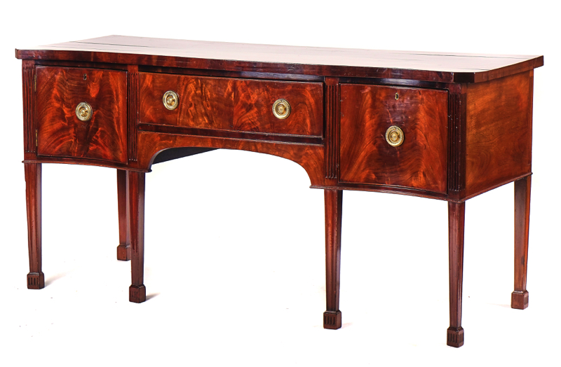 A GEORGE III SERPENTINE MAHOGANY SIDEBOARD