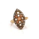 A GOLD, DIAMOND, CORAL AND HALF PEARL SET MARQUISE SHAPED CLUSTER RING