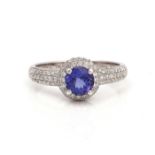 AN 18CT WHITE GOLD, TANZANITE AND DIAMOND RING