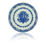 A LARGE DUTCH DELFT ARMORIAL BLUE AND WHITE DISH