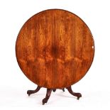 AN EARLY VICTORIAN ROSEWOOD CIRCULAR SNAP-TOP BREAKFAST TABLE