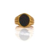 A VICTORIAN 18CT GOLD AND BLOODSTONE OVAL SIGNET RING