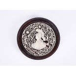 A CARVED IVORY MEDALLION OF EMPRESS CATHERINE THE GREAT