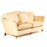 DURESTA; A MODERN ARCHBACK THREE SEAT SOFA