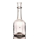 AN OCTAGONAL GLASS DECANTER