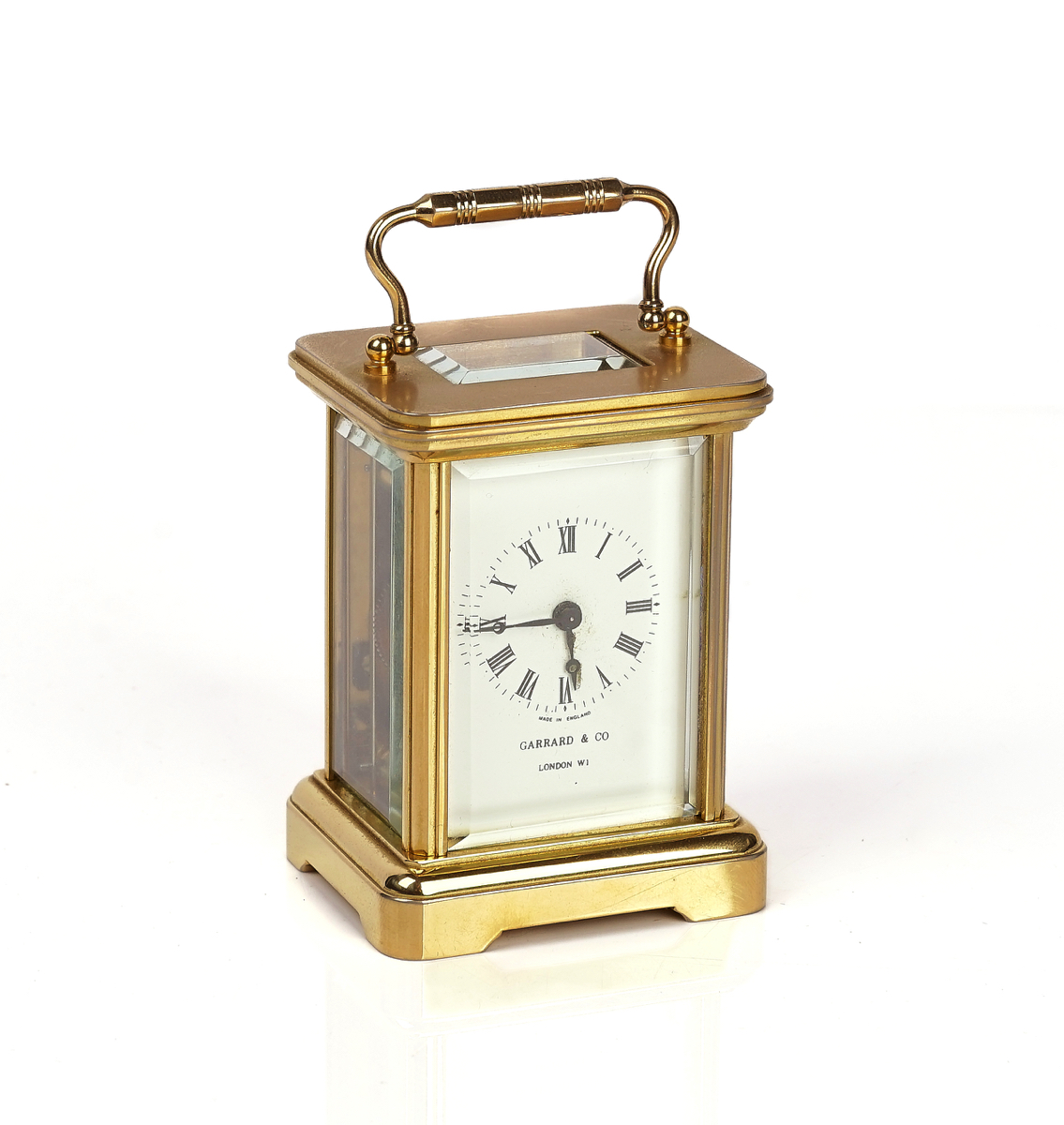 A SMALL BRASS CARRIAGE TIMEPIECE