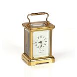 A SMALL BRASS CARRIAGE TIMEPIECE