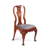 A GEORGE I WALNUT VASE BACK DINING CHAIR