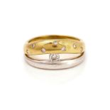 A TWO COLOUR GOLD AND DIAMOND RING