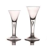 THREE PLAIN STEMMED WINE GLASSES