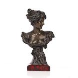 A BRONZE BUST OF AN ART NOUVEAU LADY