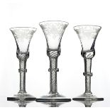 THREE ENGRAVED AIRTWIST WINE GLASSES