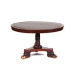 A REGENCY BRASS INLAID ROSEWOOD CIRCULAR SNAP-TOP BREAKFAST TABLE