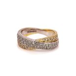 AN 18CT TWO COLOUR GOLD AND DIAMOND RING