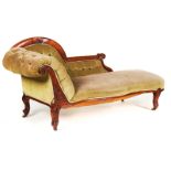 A VICTORIAN WALNUT FRAMED SHAPED BACK CHAISE LONGUE