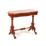 A VICTORIAN FIGURED WALNUT CARD TABLE