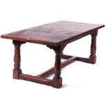 A 17TH CENTURY STYLE OAK REFECTORY DINING TABLE