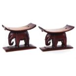 A PAIR OF 20TH CENTURY AFRICAN HARDWOOD STOOLS