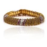 A GOLD, RUBY AND DIAMOND BRACELET