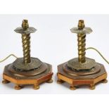 A PAIR OF SWEDISH EMBOSSED BRASS CANDLESTICKS