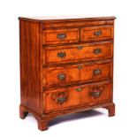 A 18TH CENTURY AND LATER FIGURED WALNUT CHEST