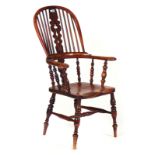 A 19TH CENTURY YEW AND ELM WINDSOR ARMCHAIR
