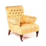 A VICTORIAN BUTTON-BACK EASY ARMCHAIR