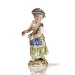 A MEISSEN FIGURE OF A GIRL