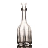 A GLASS CRUCIFORM DECANTER