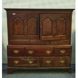 A 17TH CENTURY OAK BACON CUPBOARD