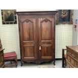 A LATE 18TH/EARLY 19TH CENTURY FRENCH WALNUT ARMOIRE