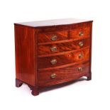 A REGENCY INLAID MAHOGANY BOWFRONT CHEST