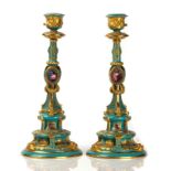 A PAIR OF RUSSIAN PORCELAIN CANDLESTICKS