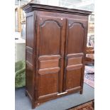 A LATE 18TH/EARLY 19TH CENTURY FRENCH OAK TWO DOOR ARMOIRE
