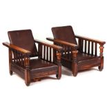 A PAIR OF MID-20TH CENTURY OAK EASY ARMCHAIRS (2)