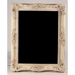 A LOUIS XVI STYLE WHITE PAINTED COMPOSITION PICTURE FRAME MIRROR