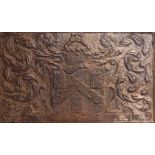 A CAST-IRON FIREBACK WITH THE ARMS OF THE WORSHIPFUL COMPANY OF IRONMONGERS