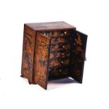A 19TH CENTURY CHINESE-EXPORT CHINOISERIE DECORATED TABLE CABINET
