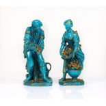 A PAIR OF SEVRES STYLE TURQUOISE AND GILT FIGURES OF GARDENERS