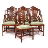 A SET OF TEN HEPPLEWHITE STYLE SHIELD BACK MAHOGANY DINNIG CHAIRS (10)